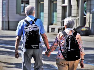 Senior couple walking in city